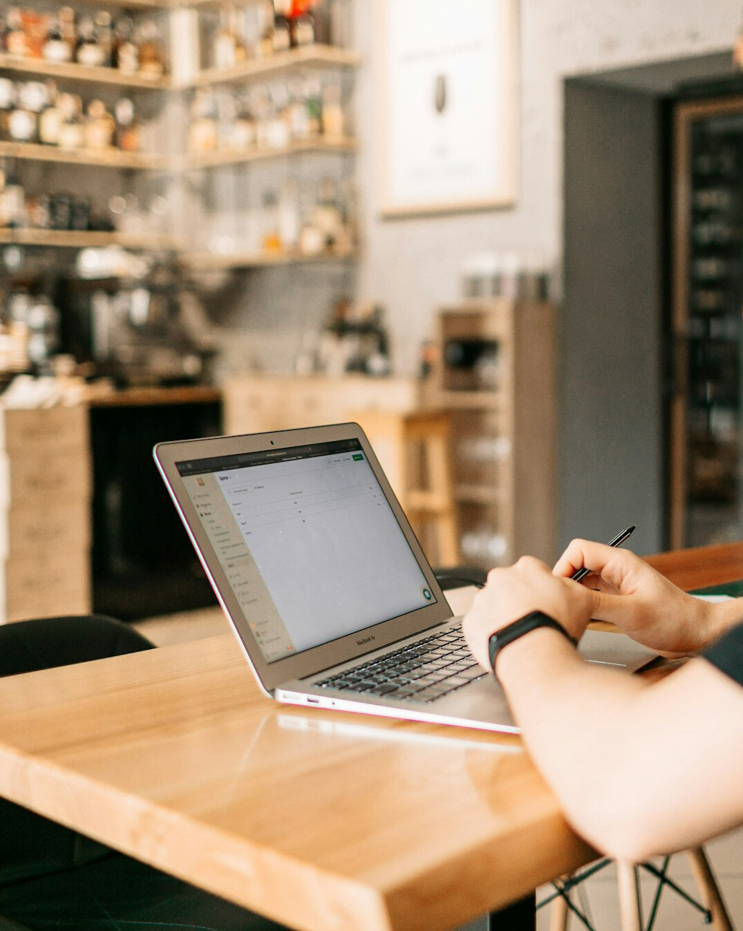 person solving puzzle on laptop