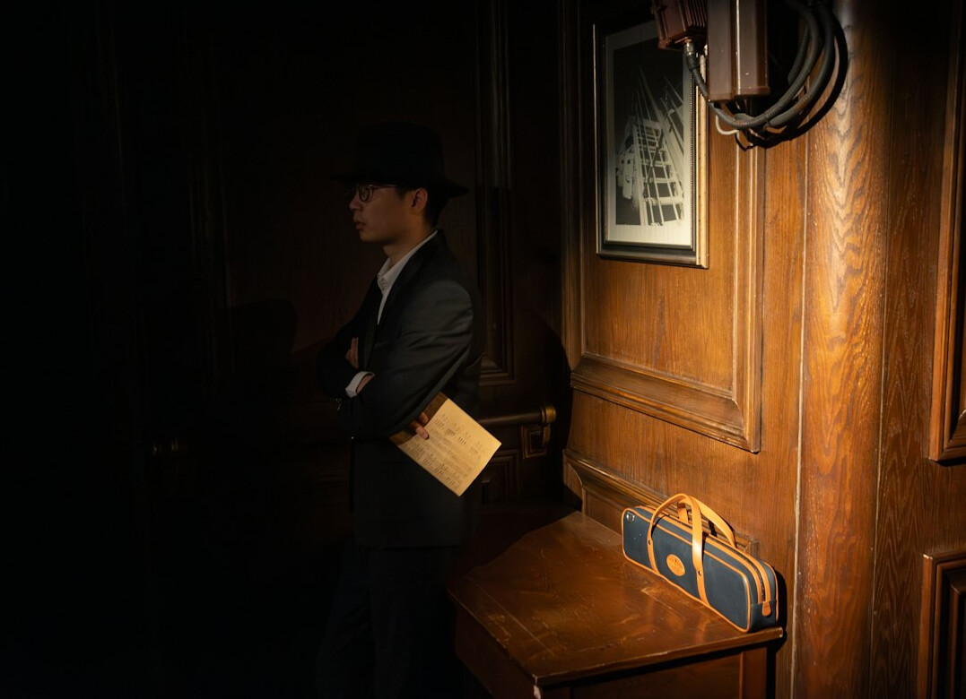 detective examining clues in room